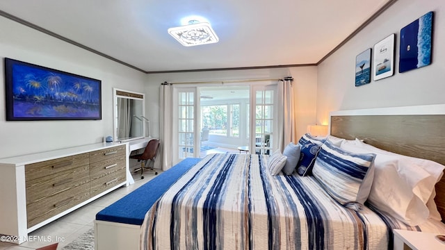 bedroom with ornamental molding, light tile patterned floors, and french doors