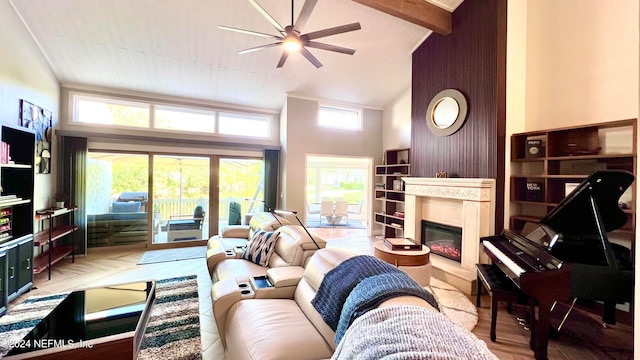 living room featuring high vaulted ceiling, beam ceiling, and ceiling fan