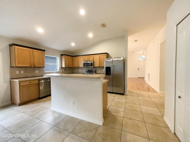 kitchen with light tile patterned floors, visible vents, appliances with stainless steel finishes, and light countertops