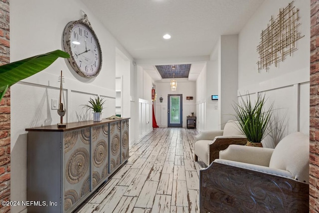 corridor featuring light hardwood / wood-style flooring