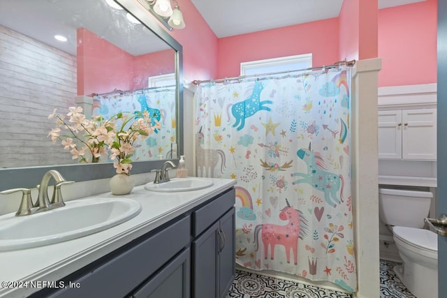 bathroom featuring tile patterned floors, walk in shower, toilet, and vanity