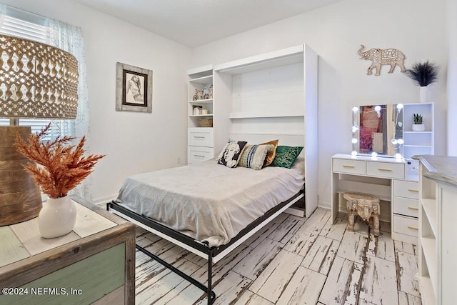 bedroom featuring light hardwood / wood-style flooring