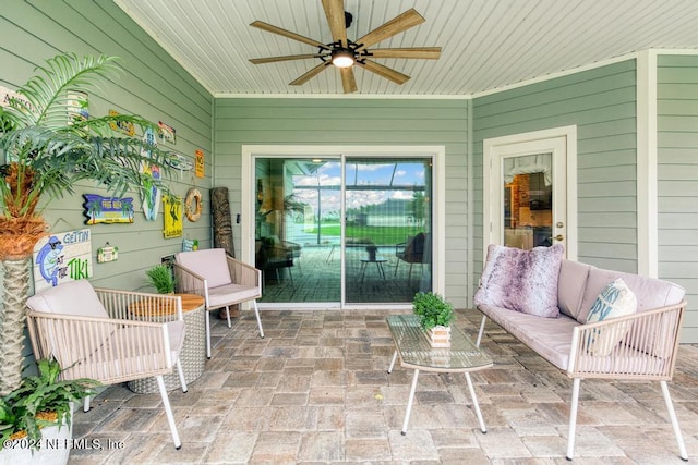 sunroom with ceiling fan