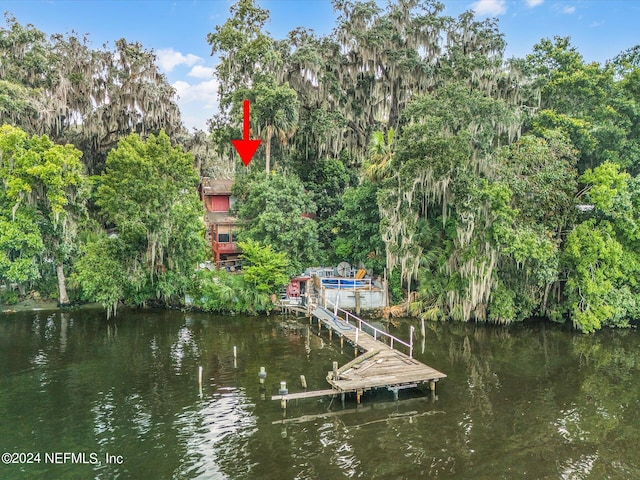 view of dock with a water view