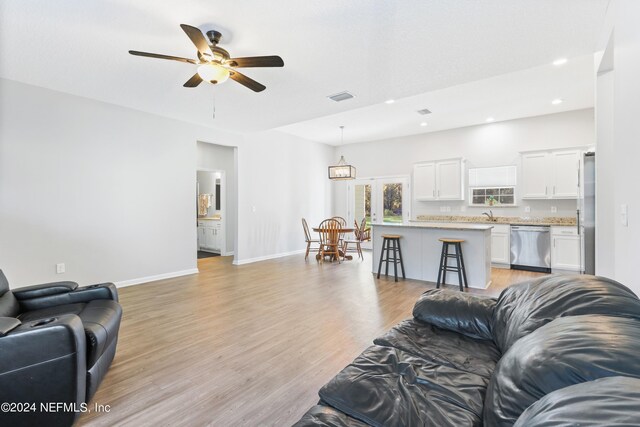 5231 Peggy Ln, Middleburg, FL 32068 - living area with recessed lighting, light wood-style floors, visible vents, and a ceiling fan