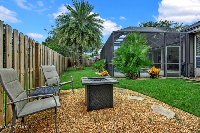 view of yard featuring a lanai