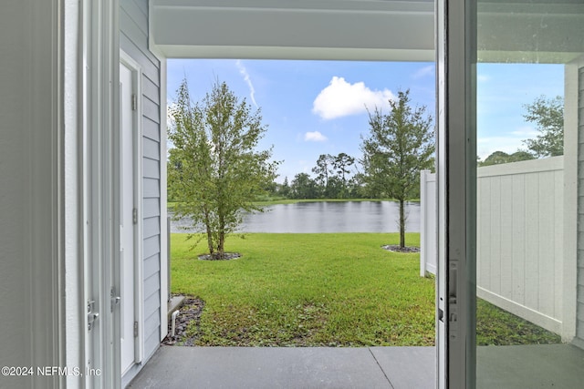 view of yard with a water view