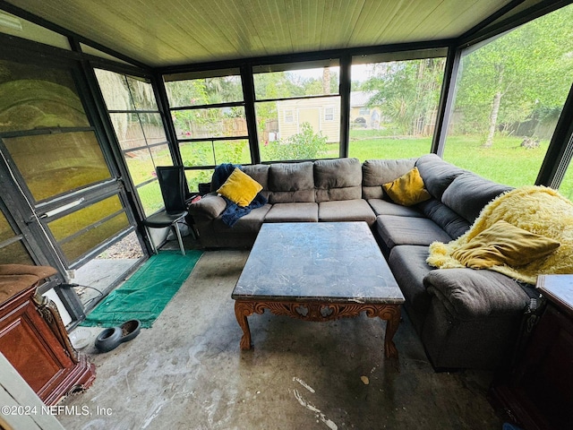 sunroom / solarium featuring a healthy amount of sunlight