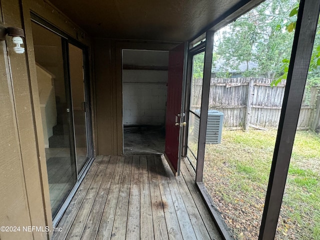 unfurnished sunroom featuring plenty of natural light