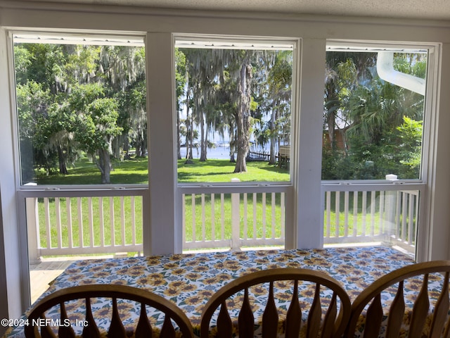 sunroom / solarium featuring a wealth of natural light