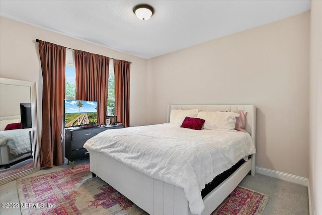 bedroom featuring carpet flooring