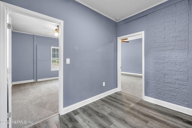 2916 Lippia Rd, Jacksonville, FL 32209 - spare room featuring a ceiling fan, crown molding, baseboards, and wood finished floors