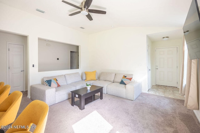 living room with ceiling fan, light carpet, and vaulted ceiling