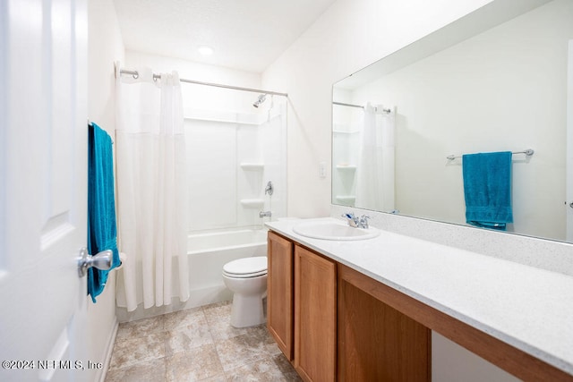 full bathroom featuring vanity, toilet, and shower / bath combination with curtain