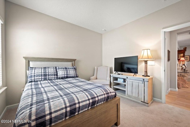 bedroom featuring light hardwood / wood-style flooring