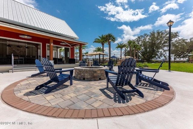 view of patio featuring a fire pit