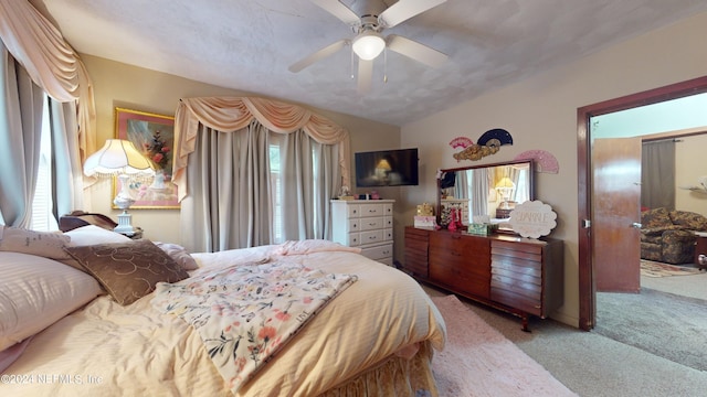 bedroom with carpet and ceiling fan