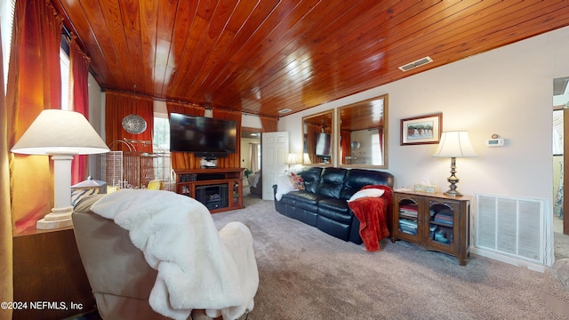 carpeted living room featuring wood ceiling and plenty of natural light