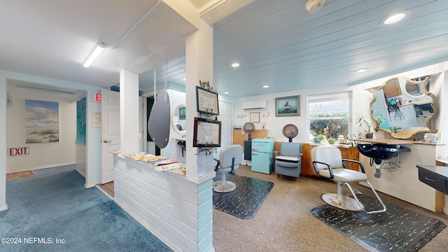 kitchen with carpet and a wall mounted AC