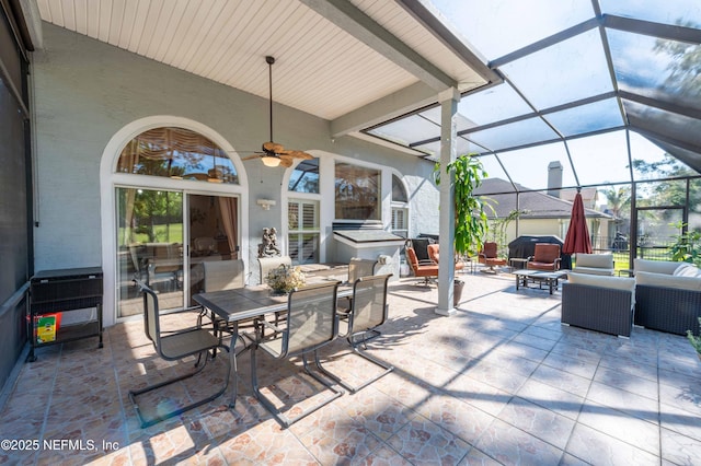 2518 Willow Creek Dr, Fleming Island, FL 32003 - view of patio featuring a lanai, outdoor dining area, and a ceiling fan