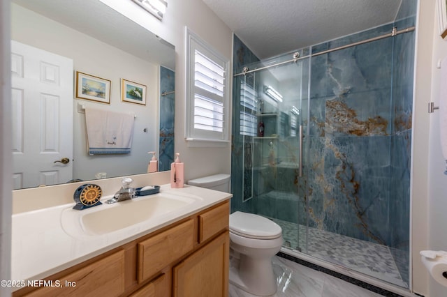 2518 Willow Creek Dr, Fleming Island, FL 32003 - bathroom with a marble finish shower, toilet, vanity, and a textured ceiling