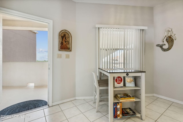 dining space with light tile patterned floors