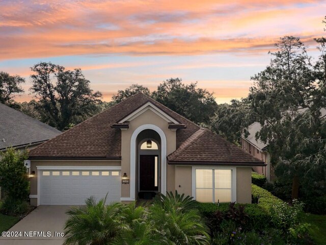 view of front of house with a garage