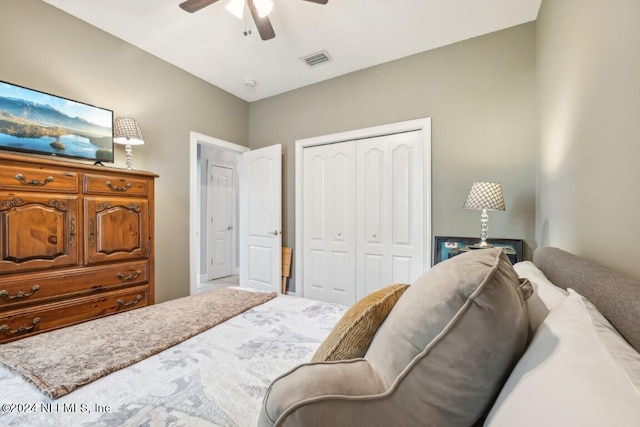 bedroom featuring a ceiling fan, a closet, and visible vents