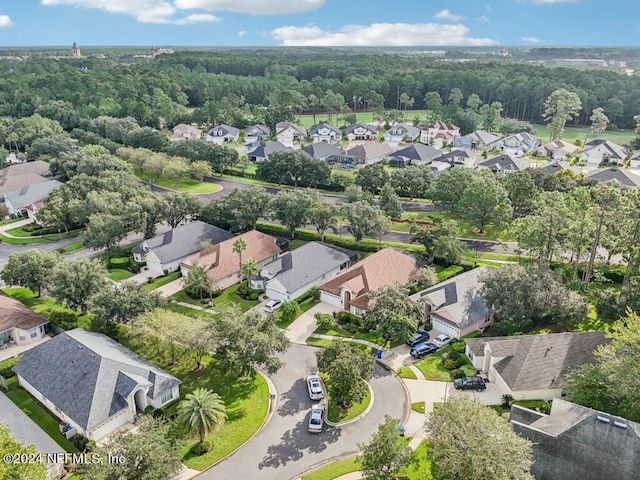 bird's eye view with a residential view and a wooded view