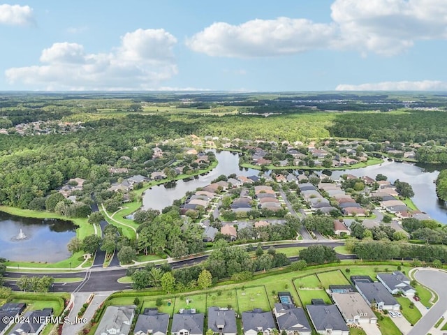 birds eye view of property with a residential view and a water view