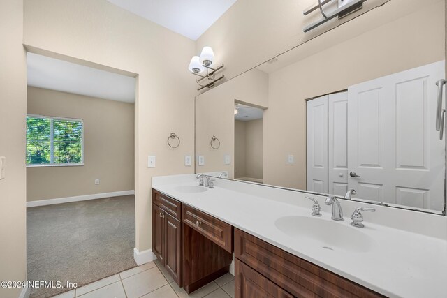 bathroom featuring tile patterned floors and vanity