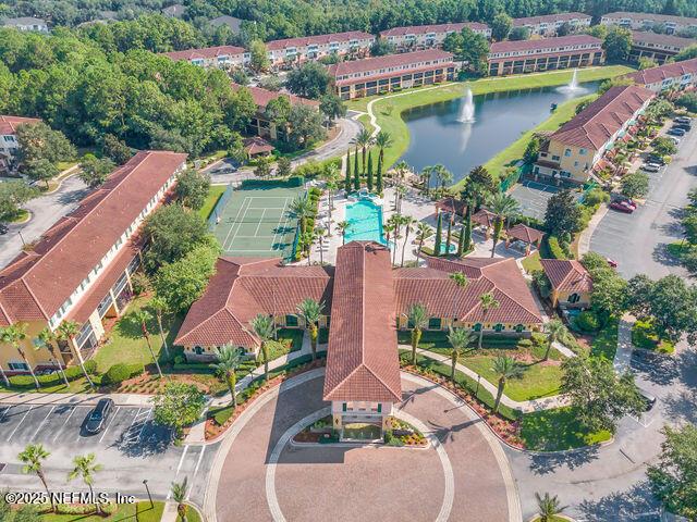 aerial view of property's location featuring a nearby body of water