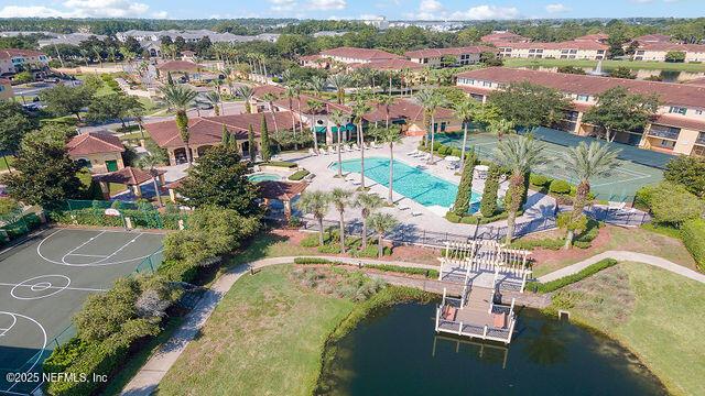 aerial view of a large body of water and a pool area