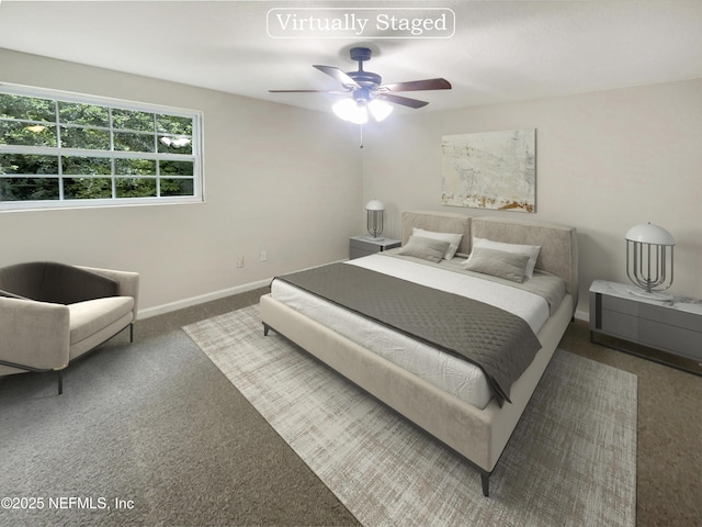 bedroom with carpet, ceiling fan, and baseboards