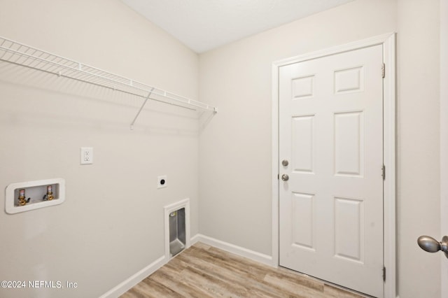 laundry area featuring electric dryer hookup, light wood-type flooring, and hookup for a washing machine