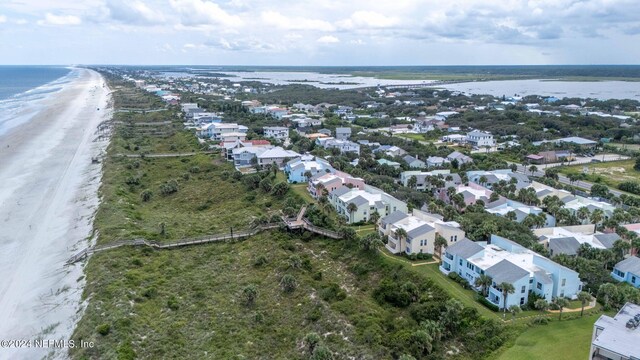 aerial view featuring a beach view and a water view