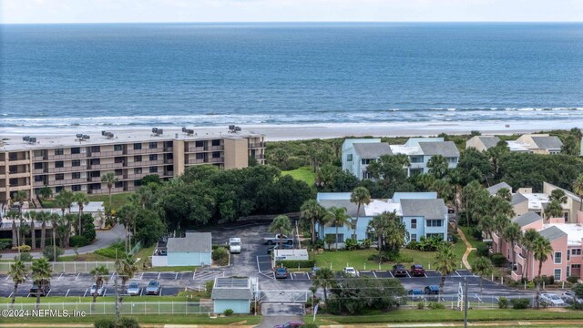 drone / aerial view with a view of the beach and a water view