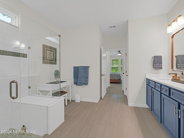 ensuite bathroom featuring ensuite bath, visible vents, baseboards, and a shower stall