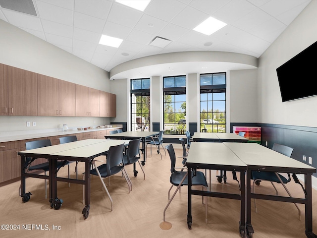 dining area featuring a wainscoted wall and visible vents