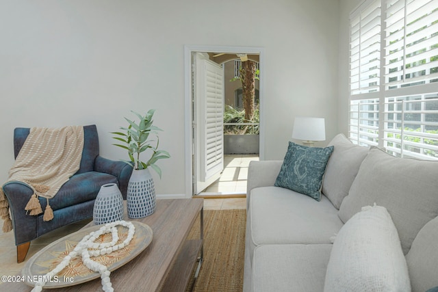 living room with tile patterned flooring