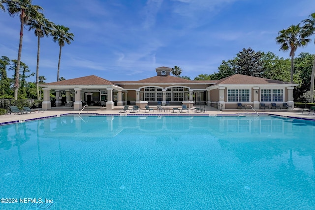 view of swimming pool featuring a patio area