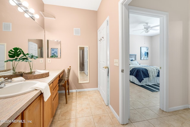 bathroom with vanity, ceiling fan, and tile patterned floors