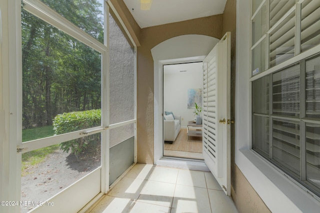 unfurnished sunroom with a wealth of natural light