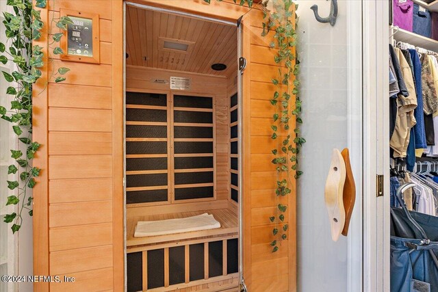 view of sauna / steam room featuring wood ceiling