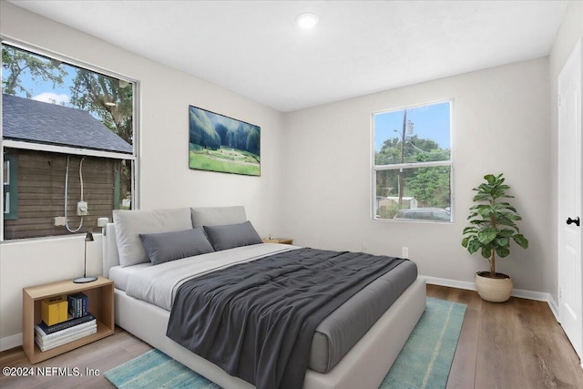 bedroom featuring hardwood / wood-style floors