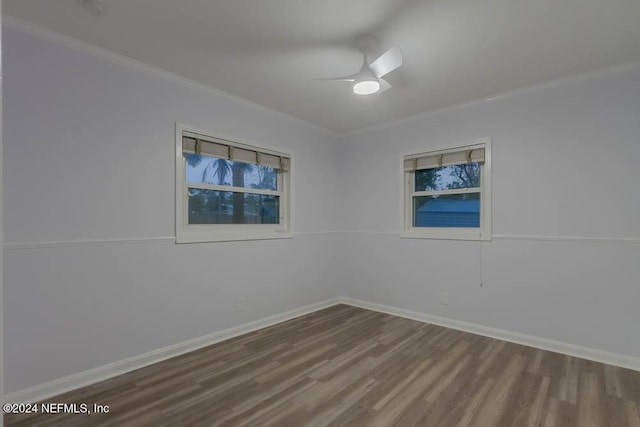 spare room with ceiling fan, ornamental molding, and hardwood / wood-style flooring