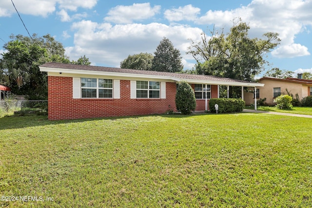 single story home featuring a front yard