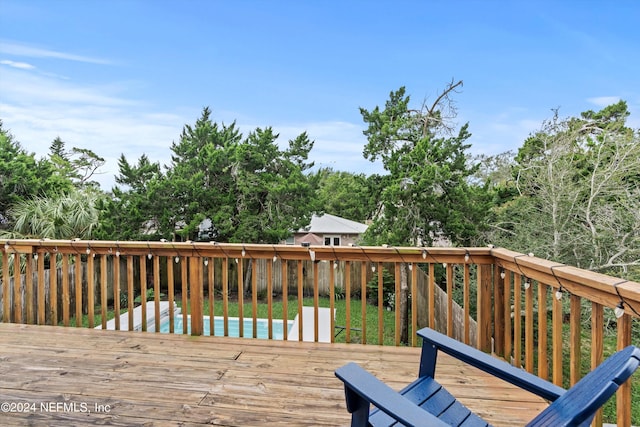 deck featuring a pool