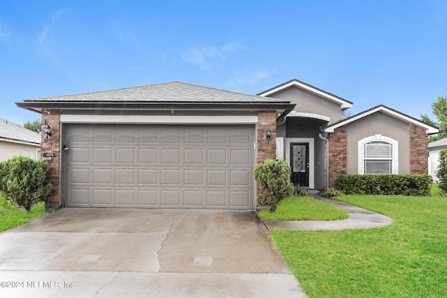 ranch-style house featuring an attached garage, driveway, roof with shingles, stucco siding, and a front lawn