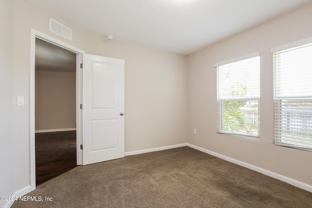 view of carpeted spare room